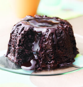 Deeply chocolate, enrobed in chocolate and filled with dark chocolate truffle. Serve wickedly warm, unleashing a rush of molten chocolate to your wild delight!