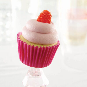 Bright raspberry filling in our moist vanilla cupcake, its top aswirl with our raspberry fluff icing. colorfully dressed in a magenta paper to enliven your case, this all natural sweetie is garnished with a naughty raspberry jelly candy.