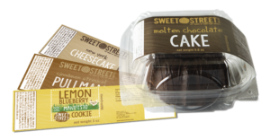 Individual Cake Slice in to-go container with repack labels. 