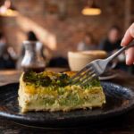 View Broccoli Cheddar Manifesto Quiche, Cafe